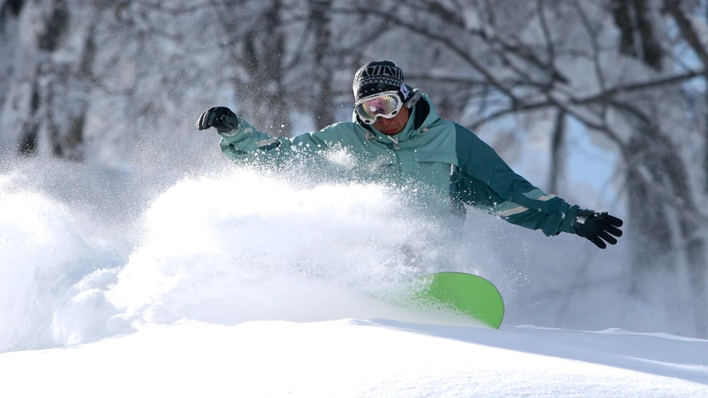 Nagano which includes snow and snow boarding as well as an individual male