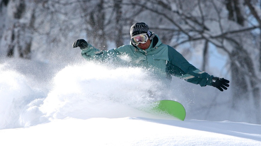 Nagano featuring snow boarding and snow as well as an individual male