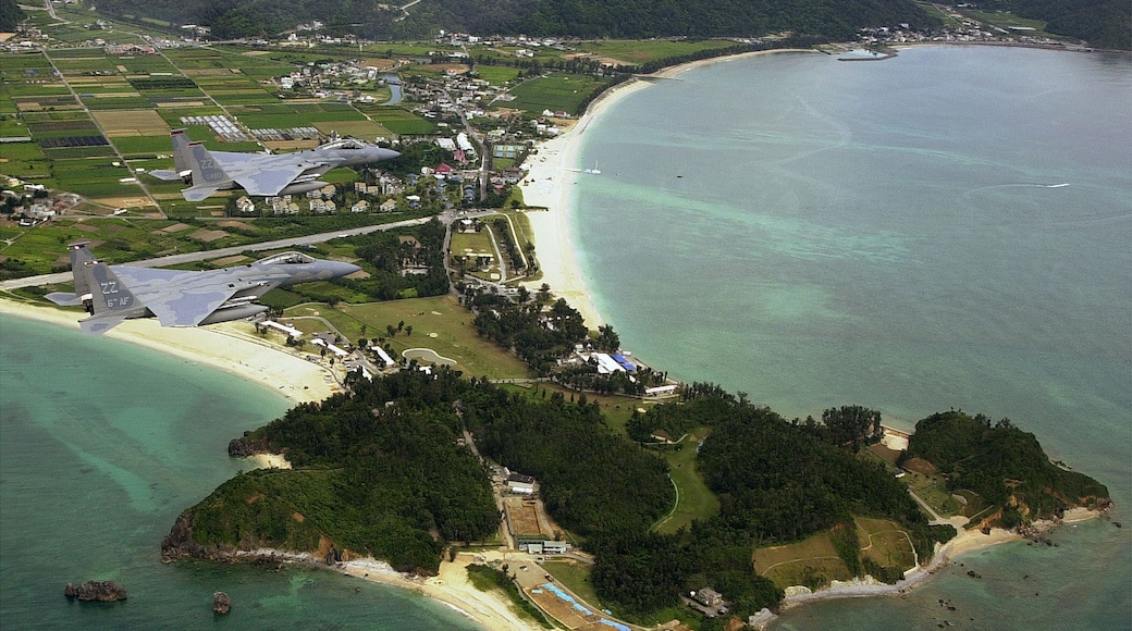 18th Wing Commander, Brig. Gen. Gary North, flies lead in a F-15D Eagle with his wingman Capt. Michael Casey, (F-15C), from the 44th Fighter Squadron, Kadena Air Base, Japan, along with two F-16 Fighting Falcons piloted by Maj. Nathan Hill and Lt. Chris Heber, 36th Fighter Squadron, 51st Fighter Wing, Osan Air Base, South Korea, during a training mission July 13, 2001, over the Pacific Ocean near Okinawa, Japan. (U.S. Air Force photo by Master Sgt. Marvin Krause) (Released)