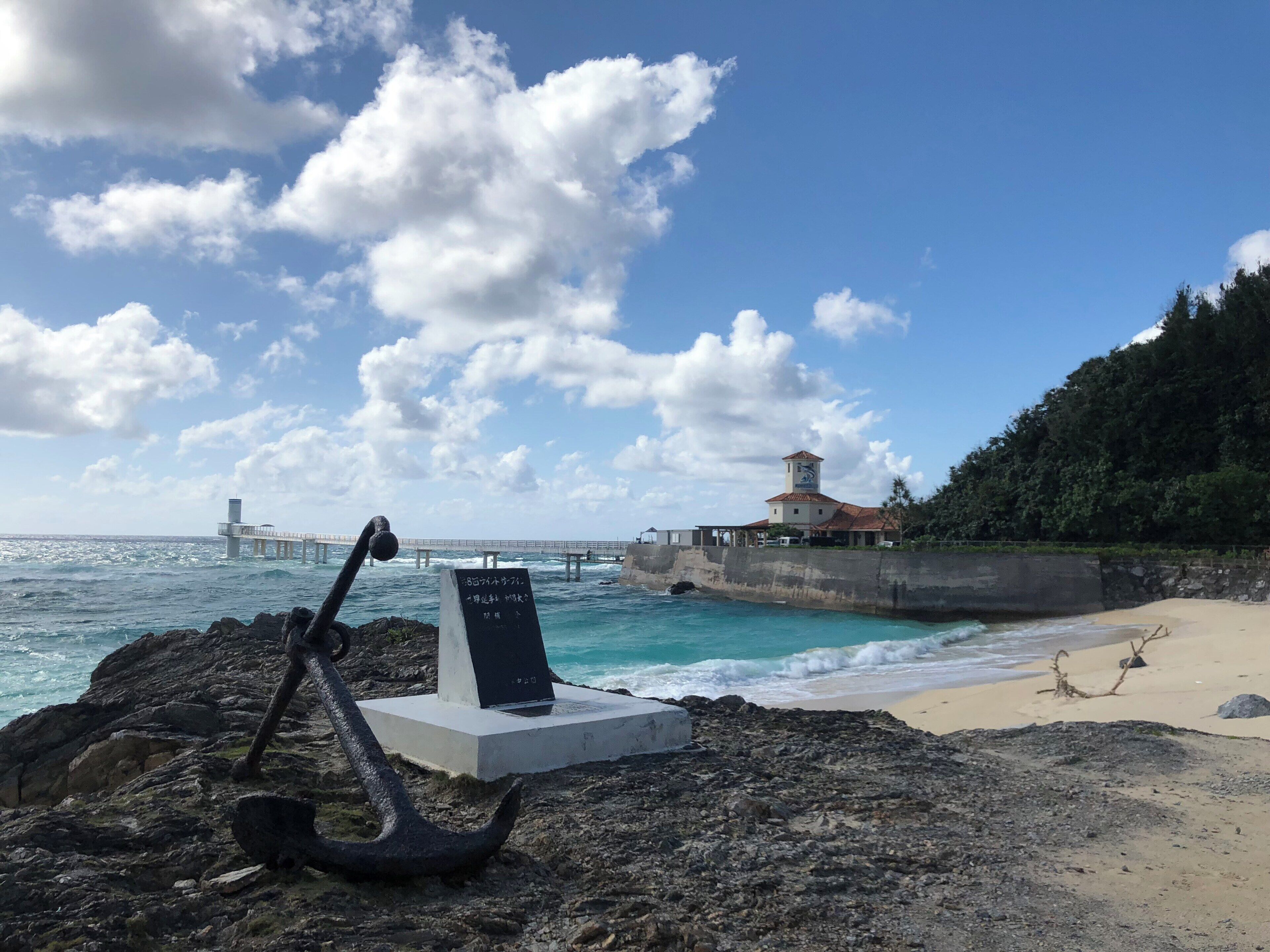 Standing by the underwater observatory at Busena Beach in Okinawa, Japan
