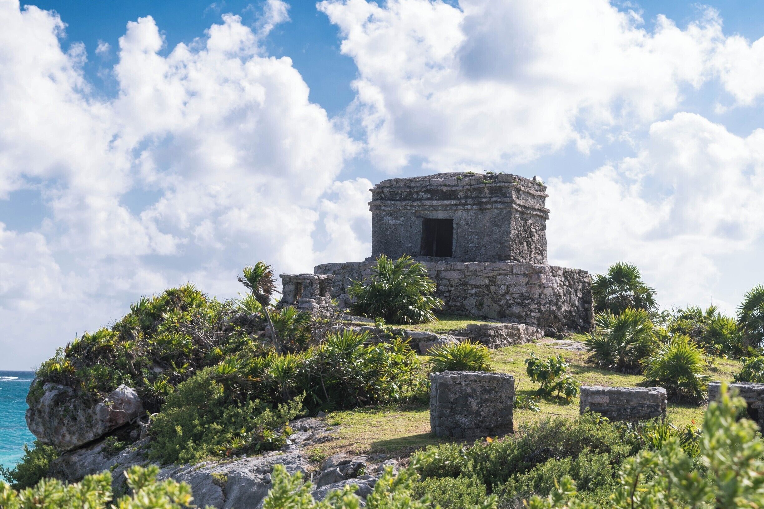 Temple of the God of Wind, is one of Tulum's most prominent Mayan ruins.  It is perched on the edge of a 12-meter limestone cliff, overlooking the Caribbean coast.
