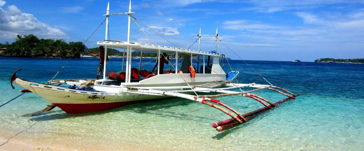 Sunny and crystal clear sea at Crystal Cove, Boracay Island. Lots of fun and adventure in this little cove island. #beach