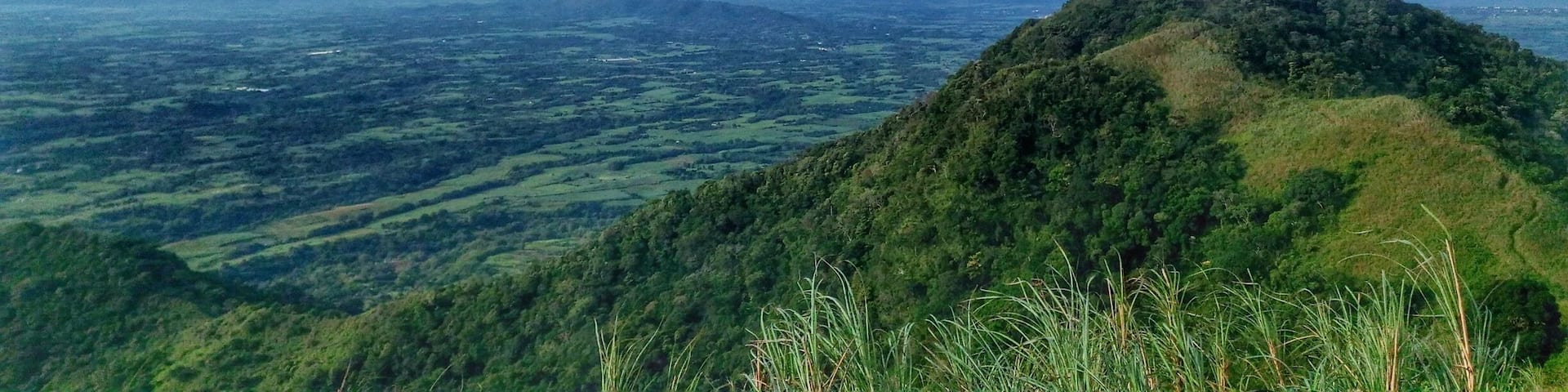 Mt. Apayang as seen from the summit of Mt. Talamitam. Traversing thru Apayang is difficult as the trail going down is very steep and there's only bamboos to cling on. Careful because some of it have torns. #TalamitamApayangBatulao #dayhiketrilogy #hiking #outdoors #nature #Philippines