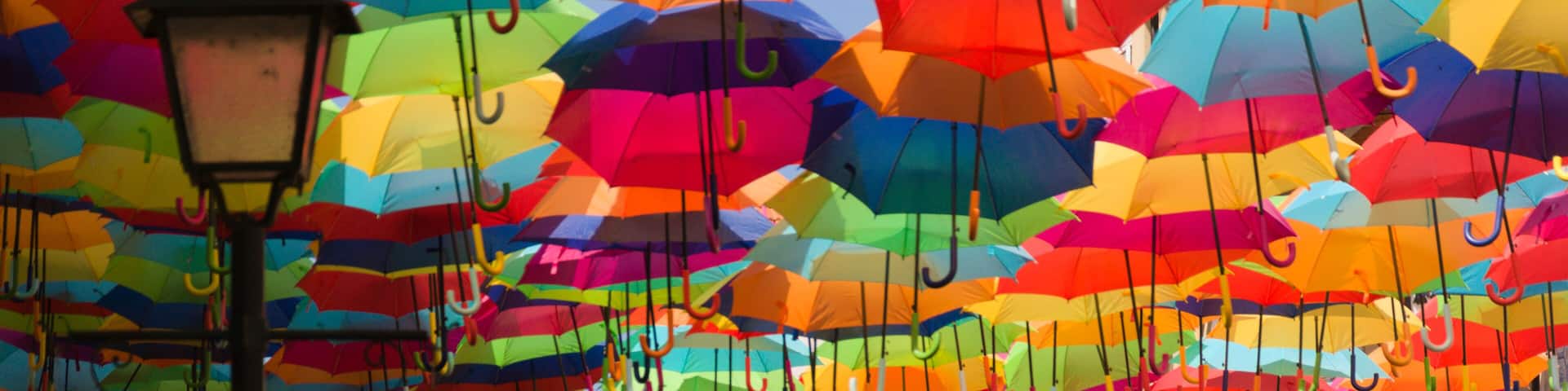Colorful umbrellas in the street. Agueda, Portugal