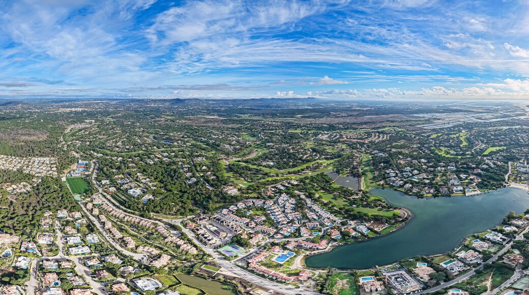 Exclusive Luxury Real Estate at San Lorenzo Golf Course: 4K Aerial View of Palatial Mansions, Private Infinity Pools, and Championship Fairways in Quinta do Lago, Algarve, Portugal