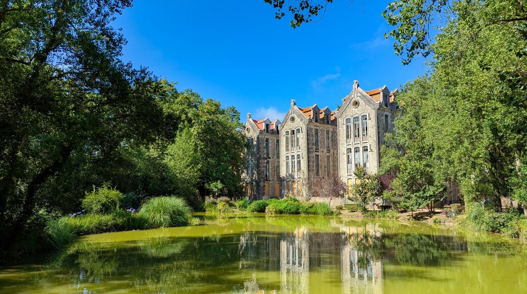 Historic Spa Pavilions, view across the pond in the Dom Carlos I Park, Caldas da Rainha, Portugal