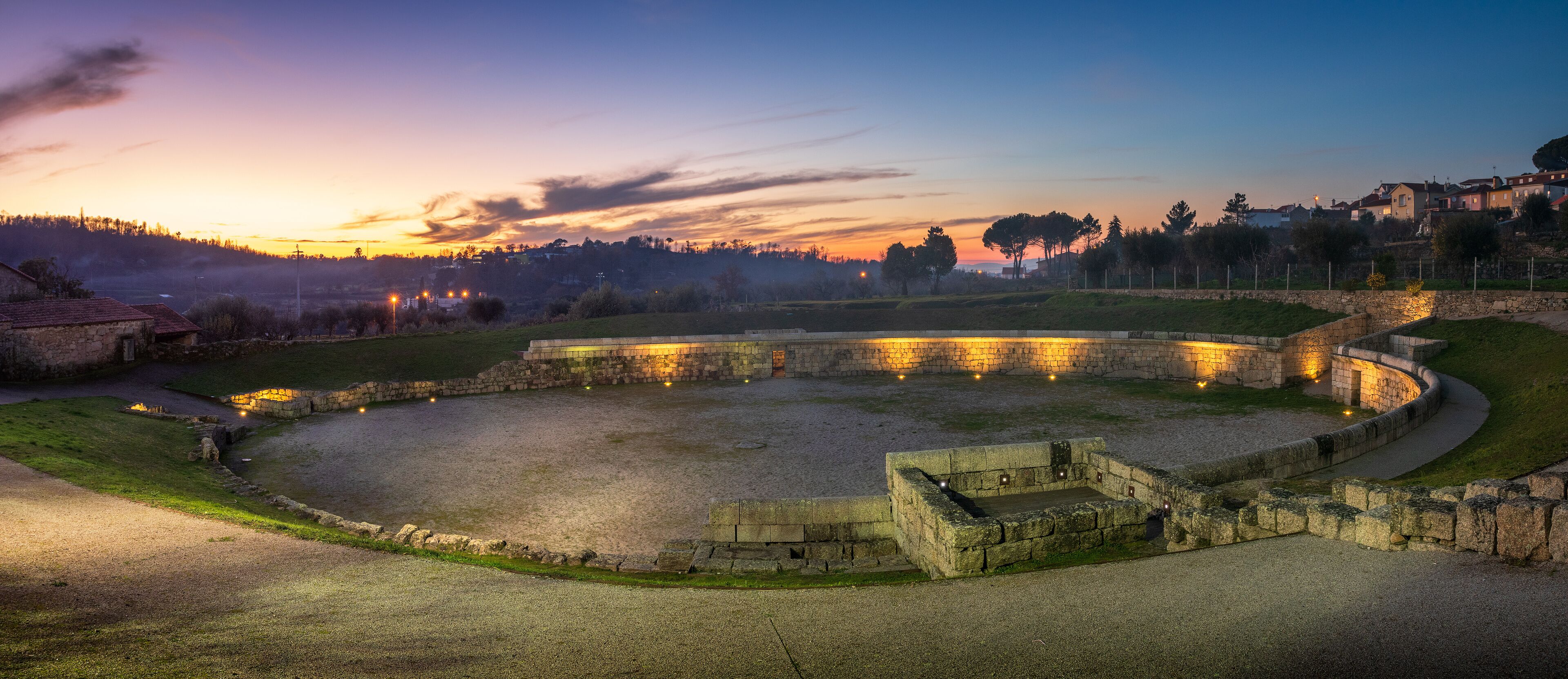 Panoramic view of the Roman Amphitheater of Bobadela, Oliveira do Hospital, Portugal, at sunset.