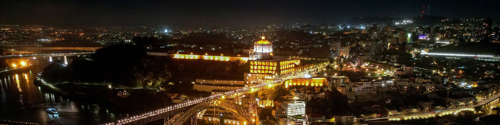 Aerial view of Dom Luis I Bridge and Douro River at night