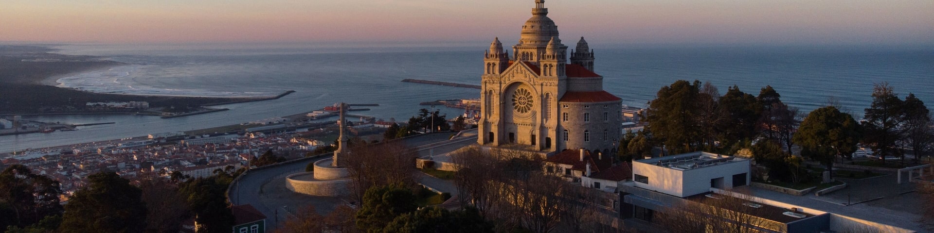 Aerial sunrise panorama of Santuario de Santa Luzia monastery sanctuary hilltop church in Viana do Castelo Portugal