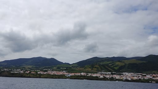 We are in the middle of the ocean on a small ferry while this photo was taken.