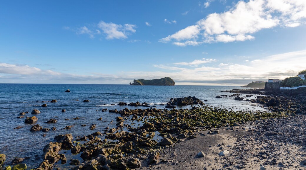 A rocky beach looking out at the Islet of Vila Franca do Campo.