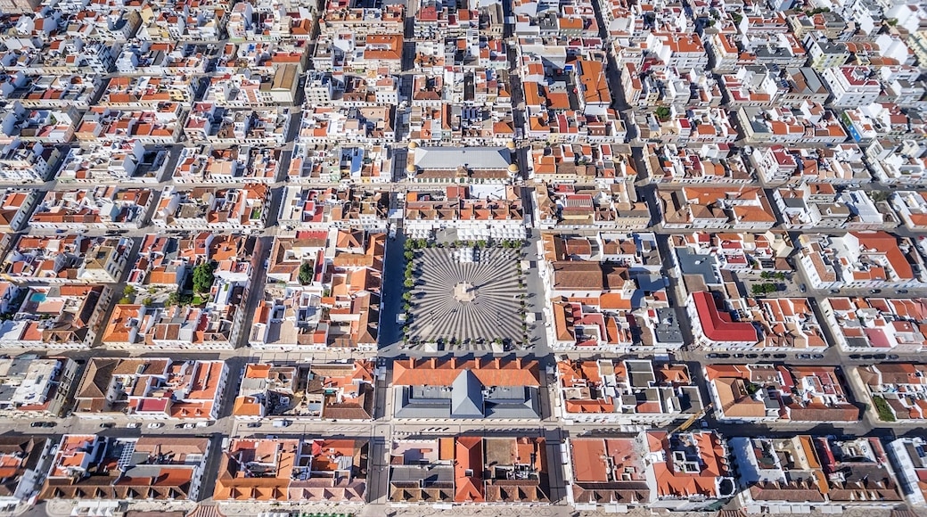 Aerial. Geometric shapes of the village Vila Real Santo Antonio from sky