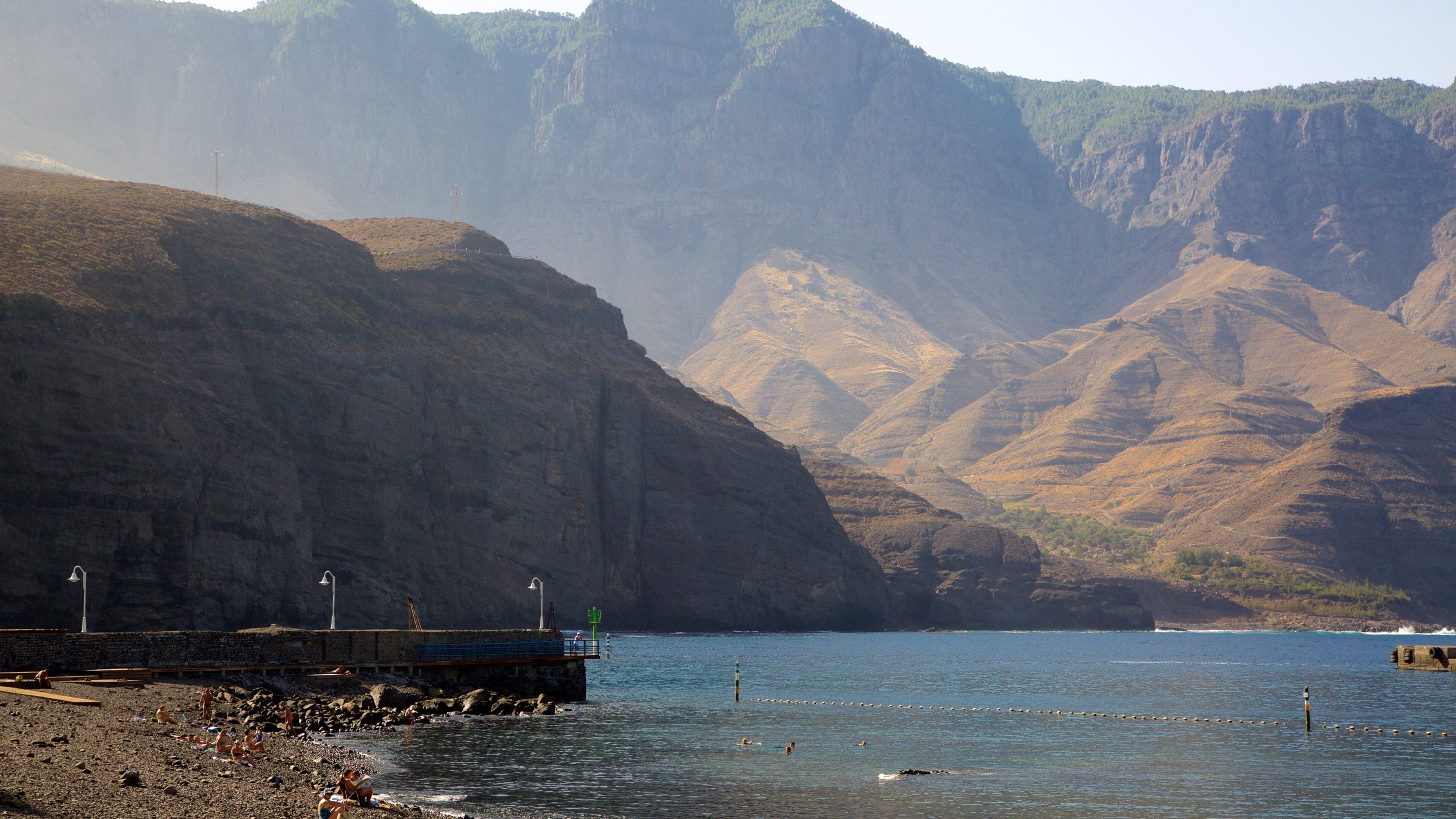 Agaete which includes mountains, general coastal views and rugged coastline