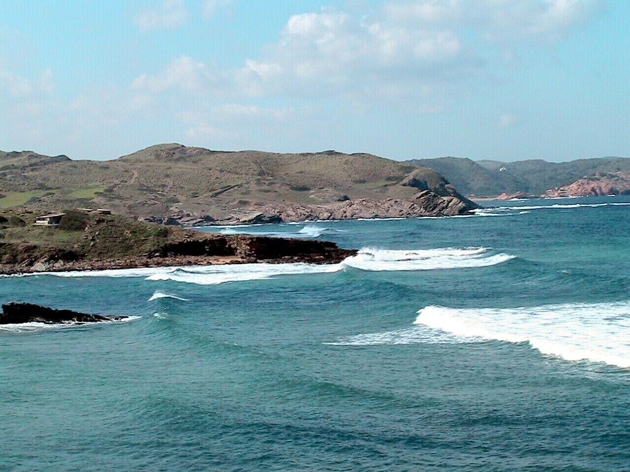 This is a a photo of a beach in the Balearic Islands, Spain, with id: