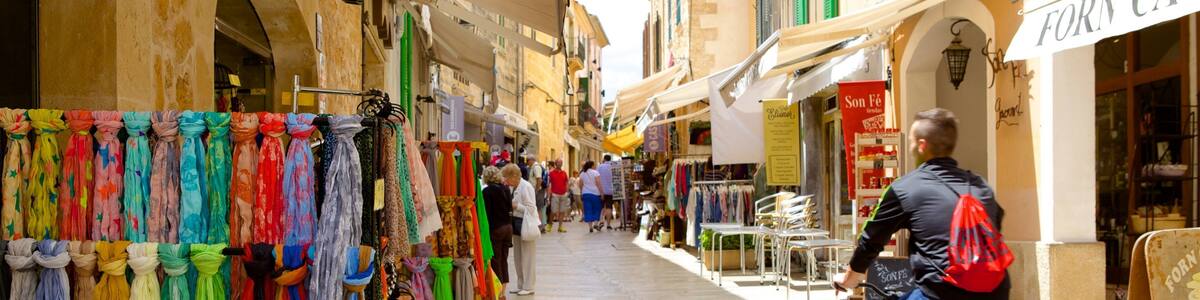 Alcudia which includes street scenes, cycling and shopping