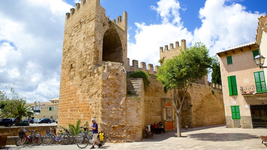 Alcudia featuring building ruins, heritage architecture and château or palace