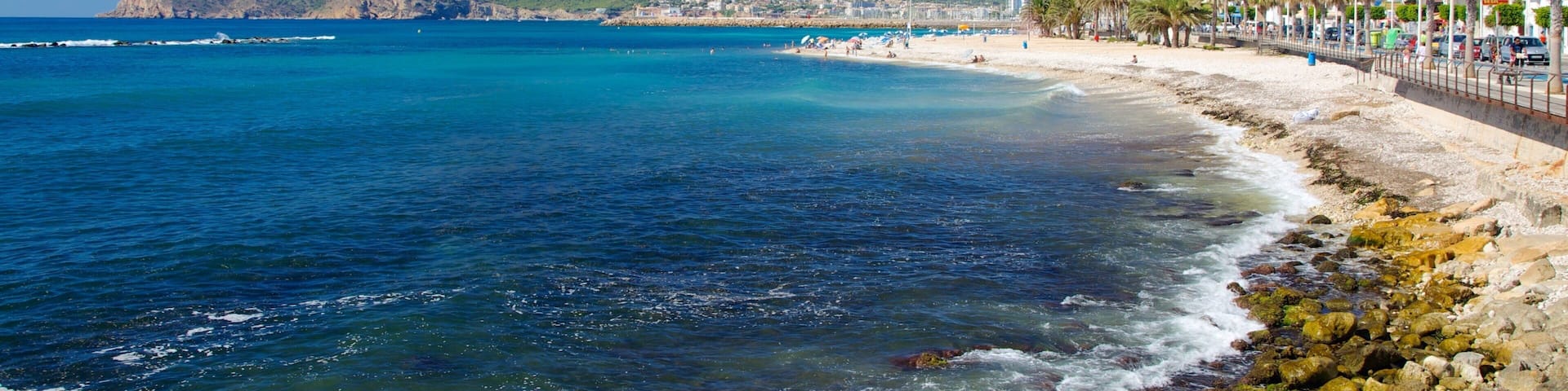 Altea featuring rugged coastline, a coastal town and mountains