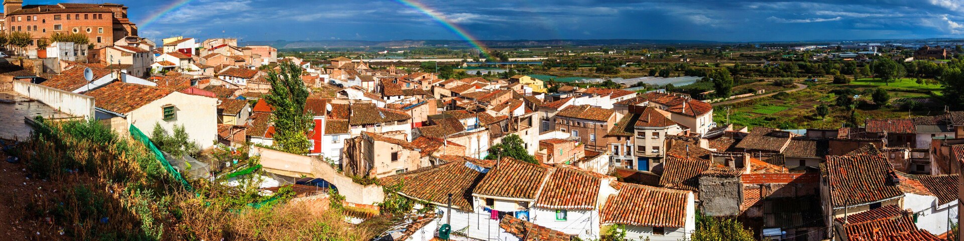 Aerial view of Calahorra with a rainbow
