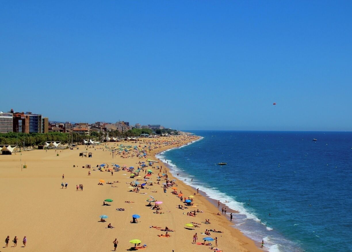 Let me preface these discoveries by saying that I ended up in Calella haphazardly. It is not necessarily a town that I would generally recommend. It is not your traditional Spanish/Catalan dream destination. It very much looks like something the 70's spit out and no one ever bothered to clean up.

With that said, I freaking love this little freakish town, which I quickly & affectionately nicknamed "The Twilight Zone."

The strangest occurrences happened throughout the month, yes MONTH, I lived in Calella. 

Apparently since the 70's, Calella, was a booming tourist destination for Western Europeans and the British. It has been on a massive decline over the past decade. What's left behind though are some fun Dutch and English/Irish pubs, a small welcoming expat community, and one of the most incredible beaches you will ever lay your eyes on. 

Beautiful clean white sand for miles and crystal clear turquoise water. Parties & bars on the beach, some free concerts in the summer time and of course drinking it allowed as well.

If you happen to find yourself here, you must stop in at Beach Boys Club, tell the owners, Brian & Cathy, that Amber sent you. Then hit up Brian for his secret stash of American imported Budweiser (Did you know the bottled stuff is always produced in country? Brian believes the secrets in the water, so he gets the cans from the US. Brian is British, which makes this little story even better.)

Also, be prepared to eat a lot of rotisserie chicken. 