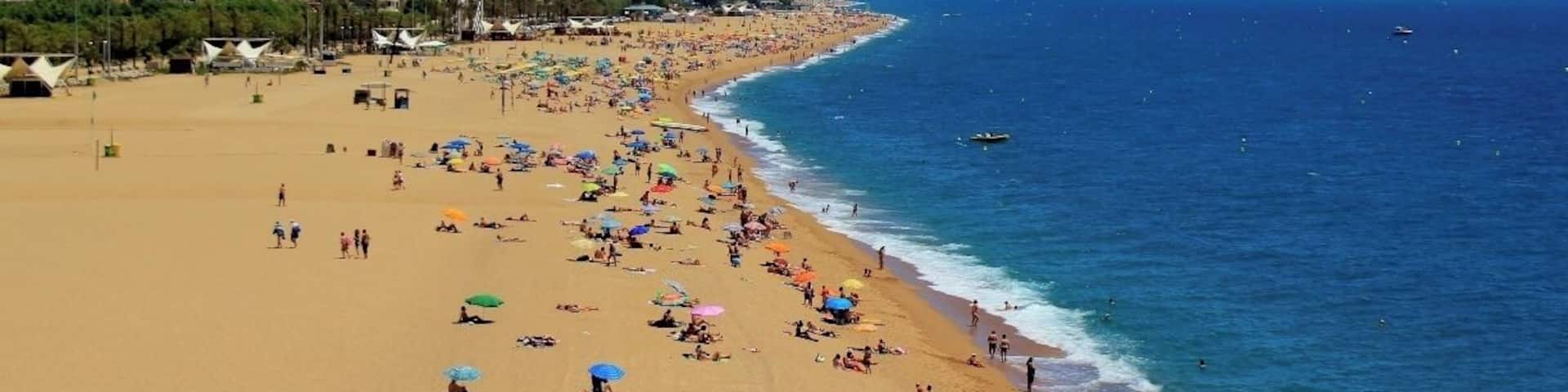 Let me preface these discoveries by saying that I ended up in Calella haphazardly. It is not necessarily a town that I would generally recommend. It is not your traditional Spanish/Catalan dream destination. It very much looks like something the 70's spit out and no one ever bothered to clean up.
With that said, I freaking love this little freakish town, which I quickly & affectionately nicknamed "The Twilight Zone."
The strangest occurrences happened throughout the month, yes MONTH, I lived in Calella.
Apparently since the 70's, Calella, was a booming tourist destination for Western Europeans and the British. It has been on a massive decline over the past decade. What's left behind though are some fun Dutch and English/Irish pubs, a small welcoming expat community, and one of the most incredible beaches you will ever lay your eyes on.
Beautiful clean white sand for miles and crystal clear turquoise water. Parties & bars on the beach, some free concerts in the summer time and of course drinking it allowed as well.
If you happen to find yourself here, you must stop in at Beach Boys Club, tell the owners, Brian & Cathy, that Amber sent you. Then hit up Brian for his secret stash of American imported Budweiser (Did you know the bottled stuff is always produced in country? Brian believes the secrets in the water, so he gets the cans from the US. Brian is British, which makes this little story even better.)
Also, be prepared to eat a lot of rotisserie chicken.