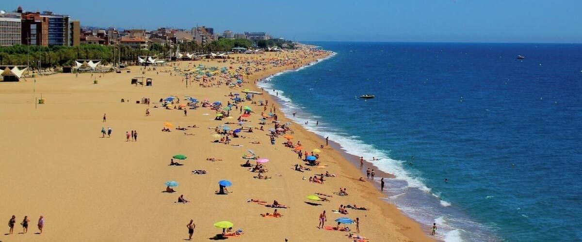 Let me preface these discoveries by saying that I ended up in Calella haphazardly. It is not necessarily a town that I would generally recommend. It is not your traditional Spanish/Catalan dream destination. It very much looks like something the 70's spit out and no one ever bothered to clean up.
With that said, I freaking love this little freakish town, which I quickly & affectionately nicknamed "The Twilight Zone."
The strangest occurrences happened throughout the month, yes MONTH, I lived in Calella.
Apparently since the 70's, Calella, was a booming tourist destination for Western Europeans and the British. It has been on a massive decline over the past decade. What's left behind though are some fun Dutch and English/Irish pubs, a small welcoming expat community, and one of the most incredible beaches you will ever lay your eyes on.
Beautiful clean white sand for miles and crystal clear turquoise water. Parties & bars on the beach, some free concerts in the summer time and of course drinking it allowed as well.
If you happen to find yourself here, you must stop in at Beach Boys Club, tell the owners, Brian & Cathy, that Amber sent you. Then hit up Brian for his secret stash of American imported Budweiser (Did you know the bottled stuff is always produced in country? Brian believes the secrets in the water, so he gets the cans from the US. Brian is British, which makes this little story even better.)
Also, be prepared to eat a lot of rotisserie chicken.