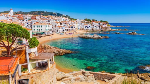 Sea landscape with Calella de Palafrugell, Catalonia, Spain near of Barcelona. Scenic fisherman village with nice sand beach and clear blue water in nice bay. Famous tourist destination in Costa Brava