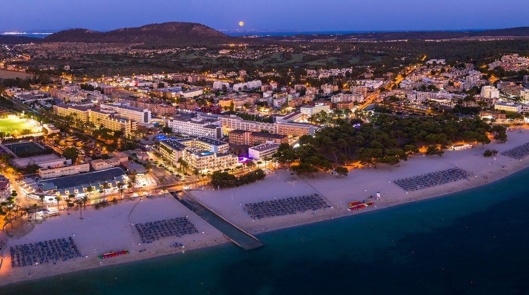 Spain, Balearic Islands, Mallorca, Calvia region, Aerial view over Costa de la Calma and Santa Ponca with hotels and beaches at dusk
