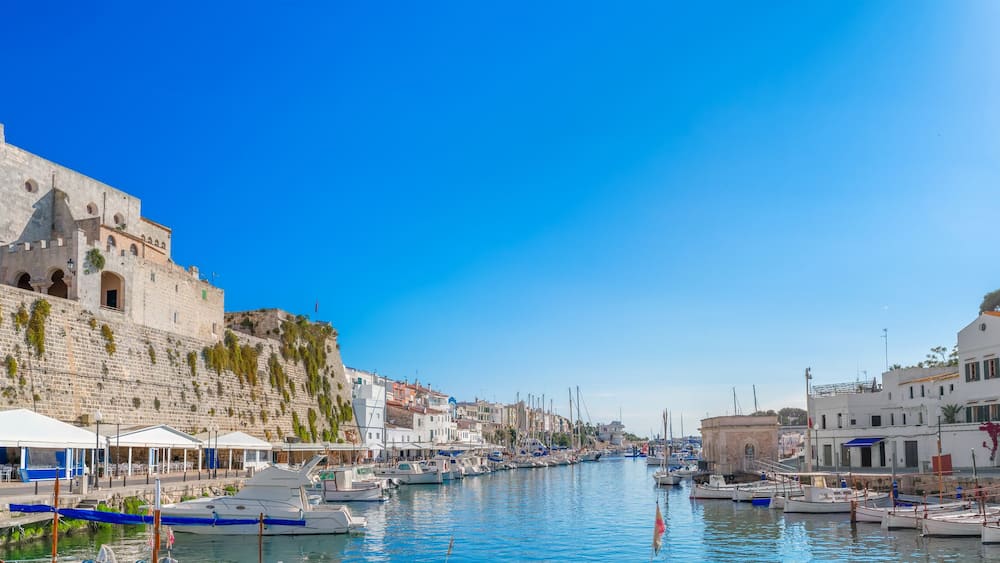 Cuitadella old town port on sunny summer day