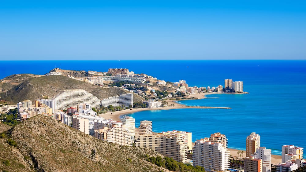 Cullera beach aerial with skyline of village in Mediterranean Valencia of Spain; Shutterstock ID 412154962; Purchase Order: -