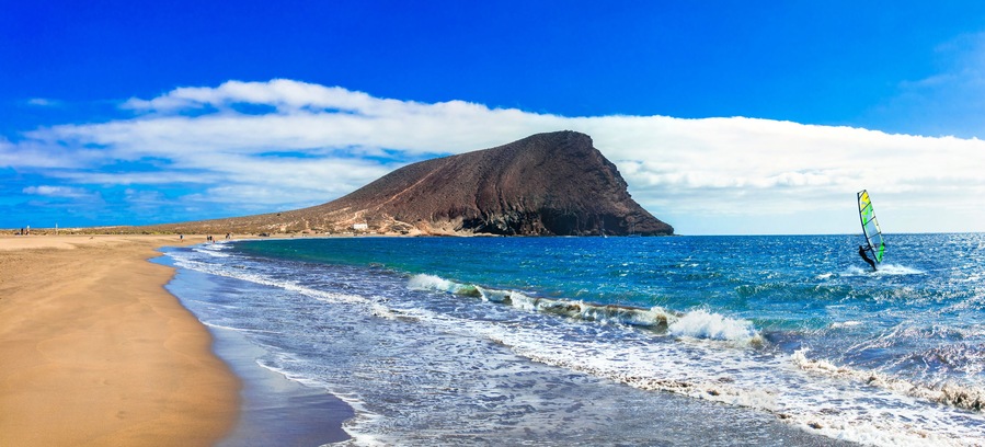 Beaches and water activities in Tenerife. La Tejita beach (el Medano). Canary islands; Shutterstock ID 795611635; purchase_order: SP-1332 HA Batch 2 August 2018; Order: ; client: HomeAway; other: To b