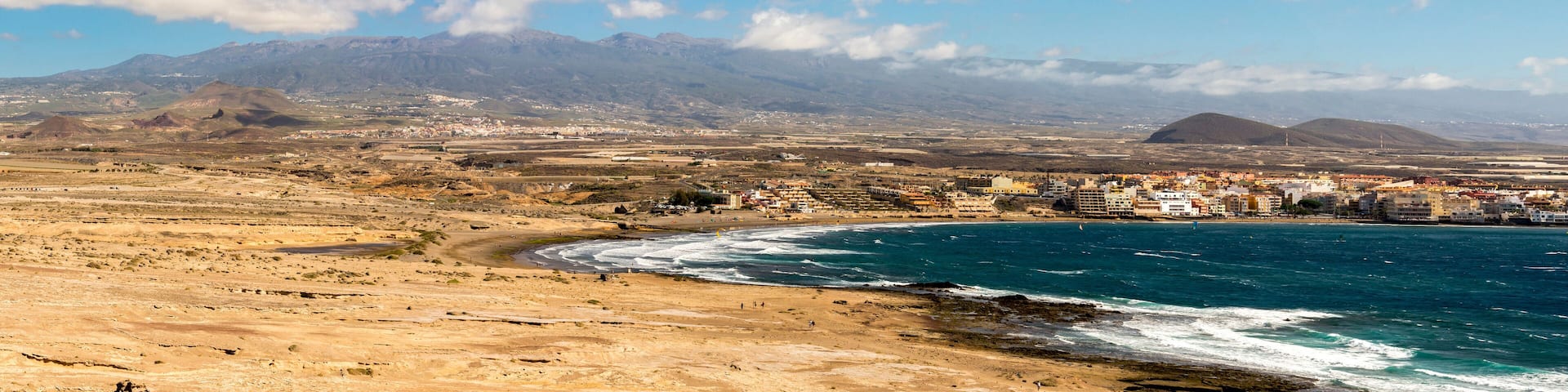 A panoramic view of Playa Leocadio Machado beach and El Medano town from Mount Roja nature reserve, Tenerife, Spain