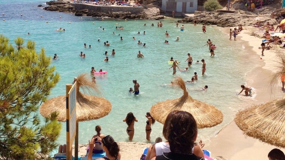 A wonderful discovery of mine when I was in Mallorca Spain. It was hidden by trees down a steep dirt path. The beach in set in an alcove screened off by rocky hillsides. The name is Cala Comtesa.