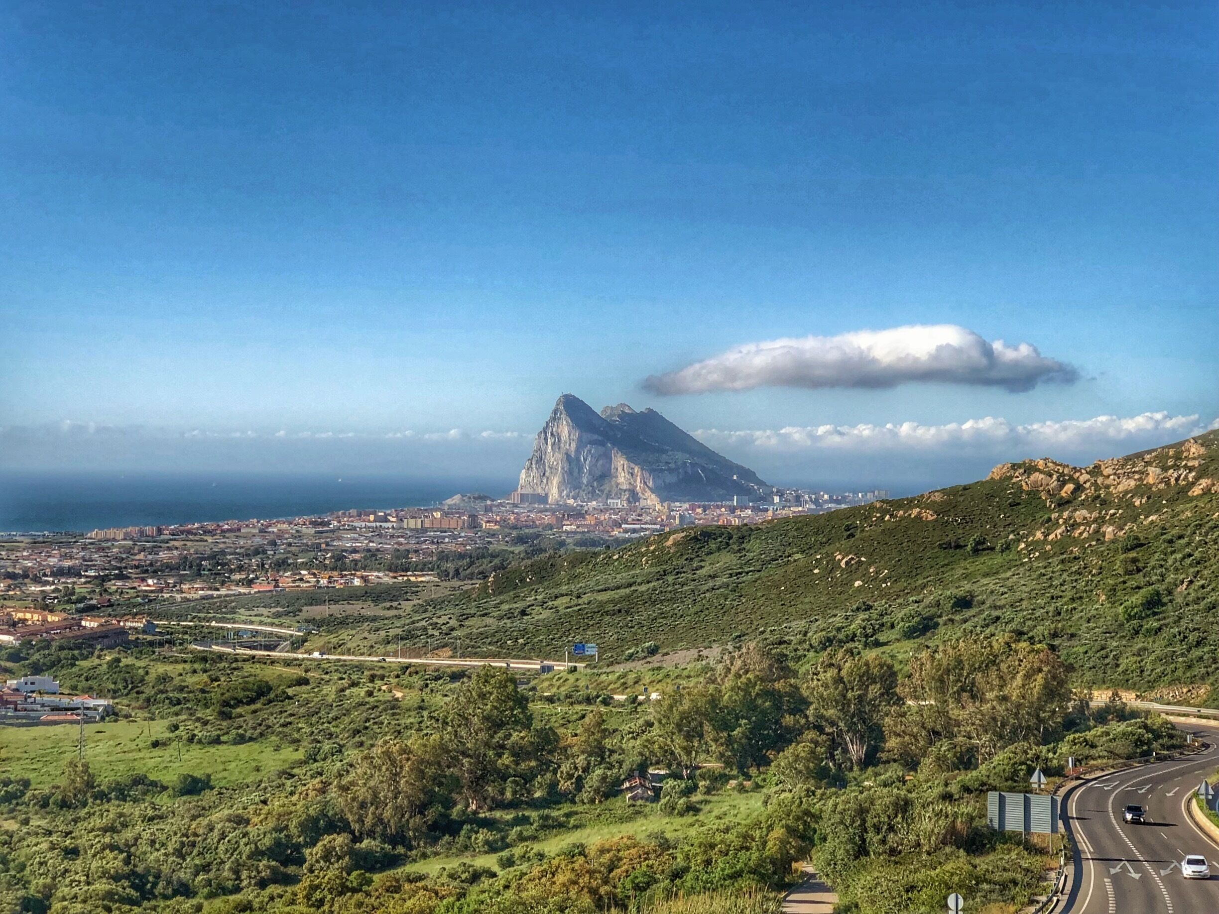 Standing in Spain, looking towards the Rock of Gibraltar.