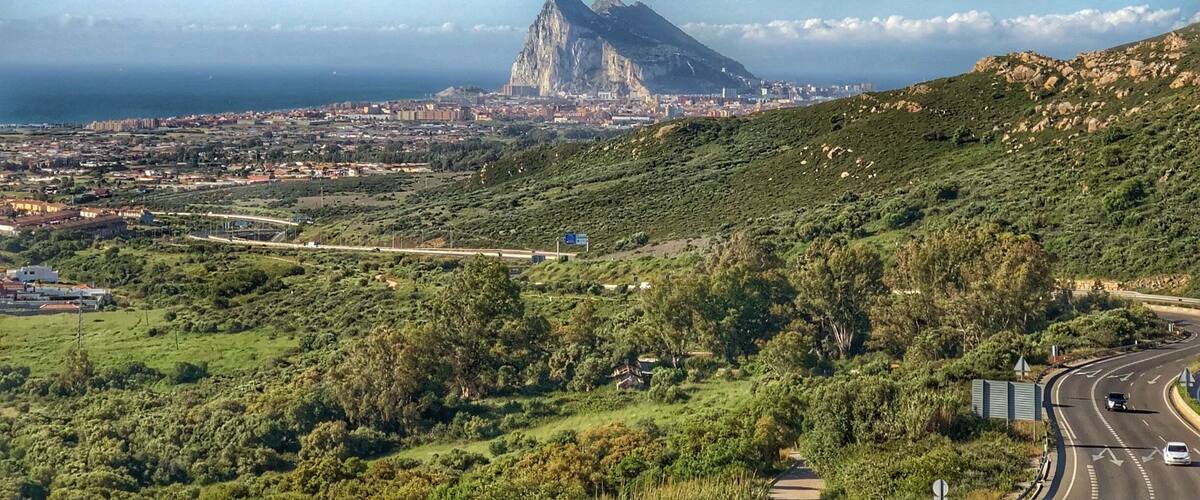 Standing in Spain, looking towards the Rock of Gibraltar.