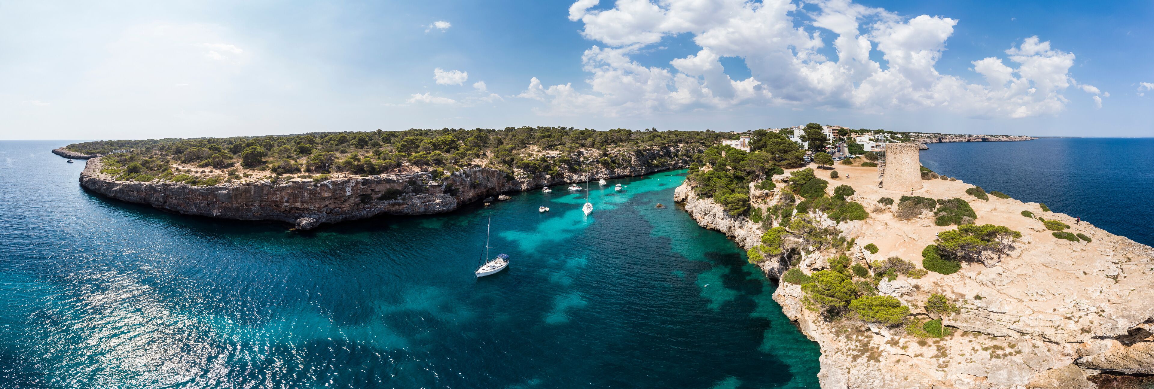 Spain, Balearic Islands, Mallorca, Llucmajor, Aerial view of bay of Cala Pi and Torre de Cala Pi