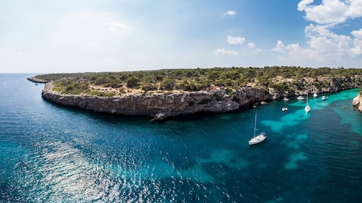 Spain, Balearic Islands, Mallorca, Llucmajor, Aerial view of bay of Cala Pi and Torre de Cala Pi