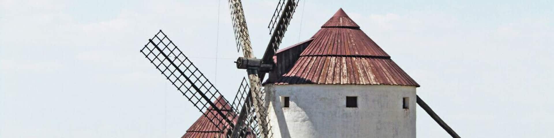 Tilting at windmills in La Mancha.