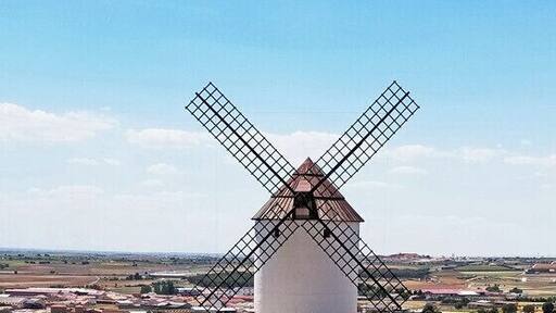 In researching my trip, I learned there are at least three sets of windmills that are frequently photographed in La Mancha - one at Consuegra, one at Campo de Criptana, and one at Mota del Cuervo. My guided day trip went to the last set. They'd looked the least picturesque online, so I was happily surprised by how lovely they were in reality!