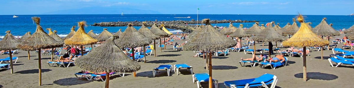 Beach in the tourist resort Playa de las Americas, Tenerife island, Canary Islands, Spain