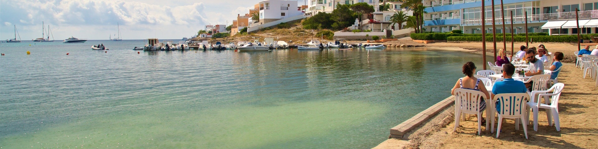 Talamanca Beach featuring a coastal town, general coastal views and outdoor eating