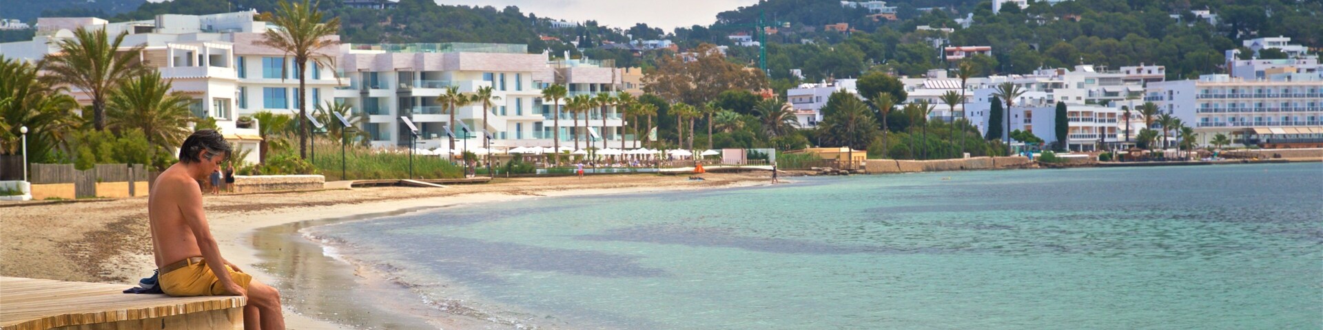 Talamanca Beach showing general coastal views, a beach and a coastal town