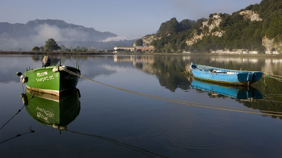 Two tied boats. Small fishing colored boats moored at Ribadesella, Asturias, North Spain, Europe.