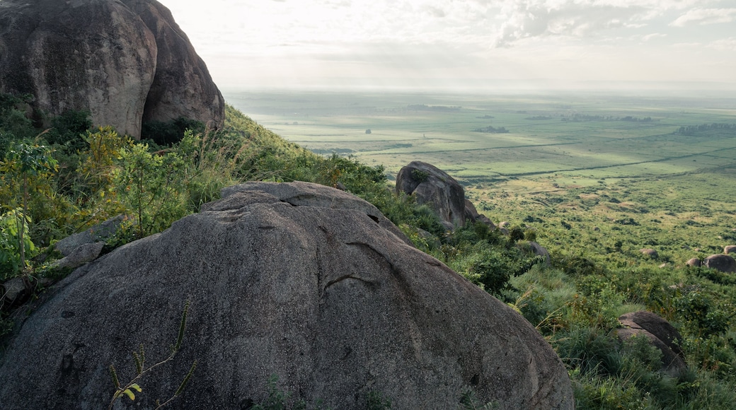 Big grey boulders at slope of Kajulu Hills with view of fields, Kisumu, Kenya, Africa