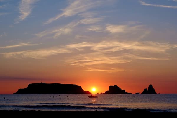 Great spot to watch the sunrise over the Islas Medas. Long sandy beach and plenty of space.