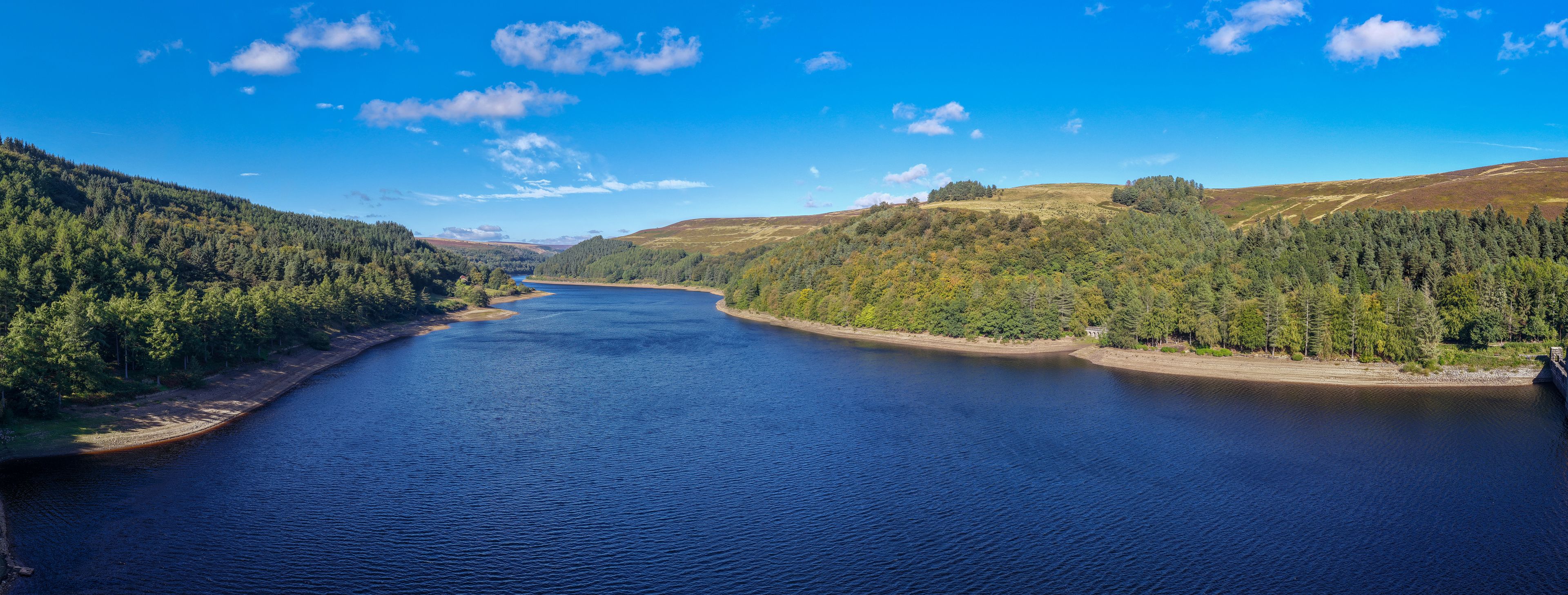 Aerial Panorama of Derwent Reservoir and Forested Valley in Peak District National Park, UK. 