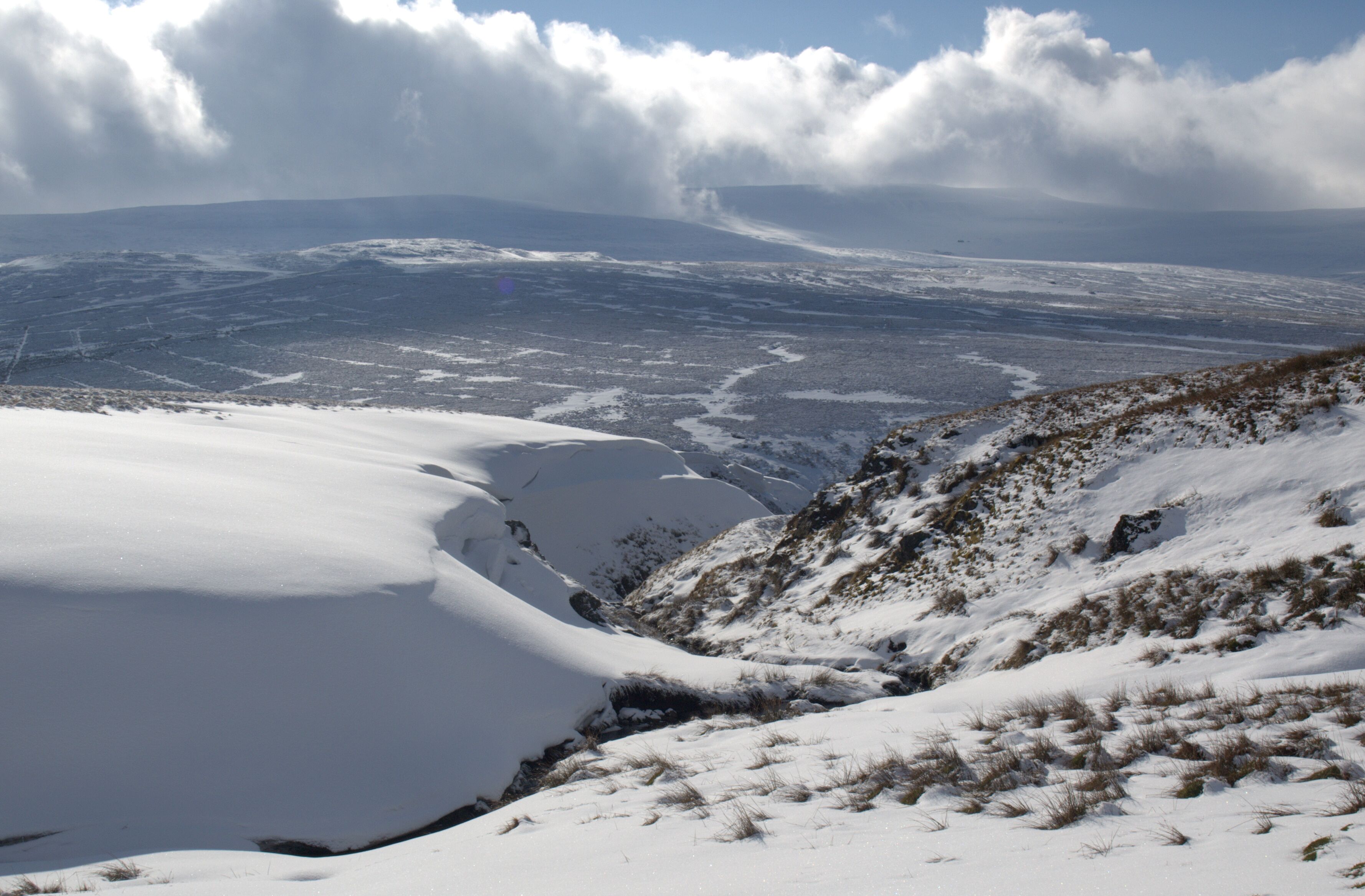 Stanners Gill Snow Looking down Stanners Gill and beyond towards Cross Fell. Stanners Gill is a side valley of Cash Burn