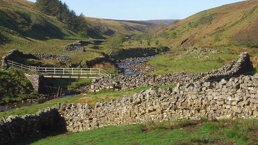 Gilderdale With the Pennine Way footbridge crossing the burn.