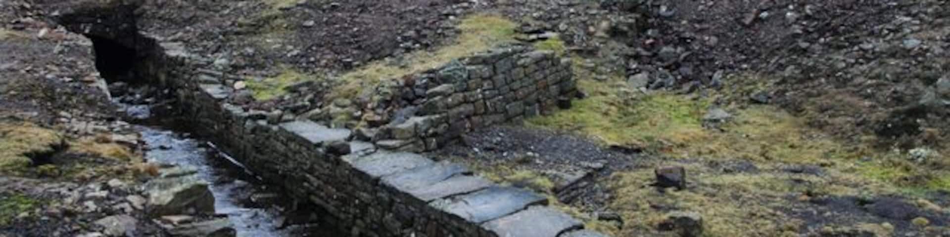 Mineworkings at the head of the River Nent Part of the old dressing floors for Smallcleugh Mine and the newly excavated Smithy Level entrance on the Nenthead Mines site at Nenthead.