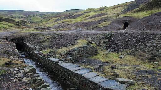 Mineworkings at the head of the River Nent Part of the old dressing floors for Smallcleugh Mine and the newly excavated Smithy Level entrance on the Nenthead Mines site at Nenthead.