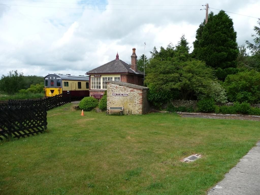 This way to the trains, Warcop Station. The Eden Valley Railway's trains depart from the original platform at Warcop, but most of their station infrastructure is now further east.